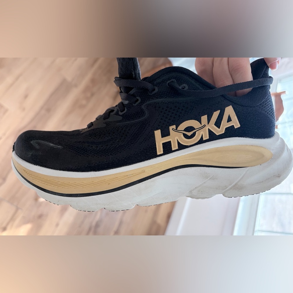Hoka Black and Gold Sneakers